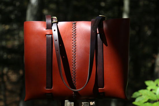 The Weekday tote in Cherrywood Red steerhide