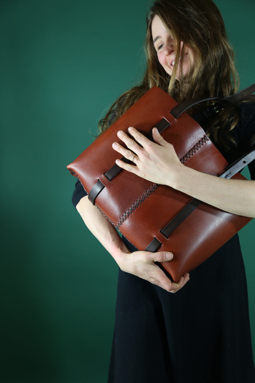 The Weekday tote in Cherrywood Red steerhide