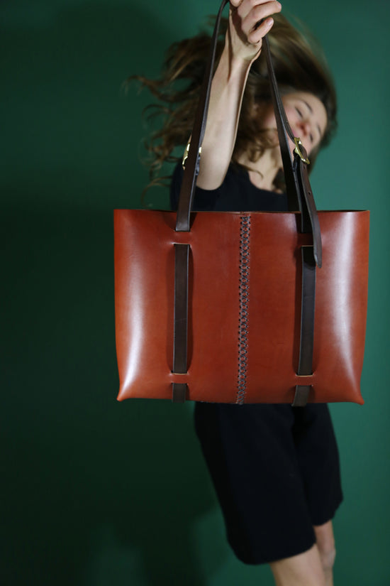 The Weekday tote in Cherrywood Red steerhide